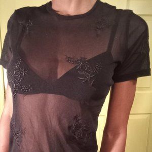 NY and Co. sheer and soft mesh top with floral embellishment. made in Macau.